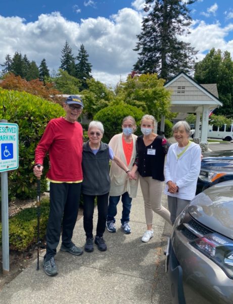 elderly friends gathering outside, learn about garden courte 