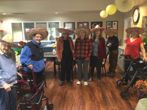 large group gathers in sombreros for cinco de mayo celebration